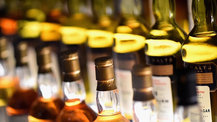 Excise Department Seizes Liquor from Vehicle During Checkpoint